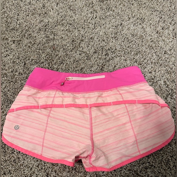 Pink Lululemon shorts with waistband design - Picture 1 of 3